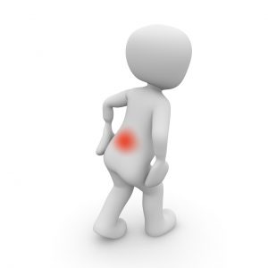 White computer generated figure with a red spot representing pain over their back.