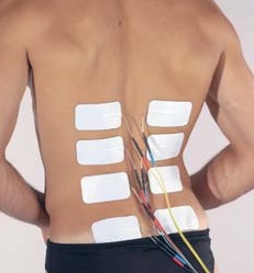 Electrodes placed in pairs along the lower back of a person