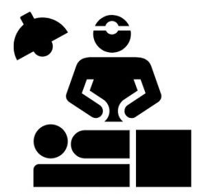 A silhouette of surgeon performing surgery on a person.